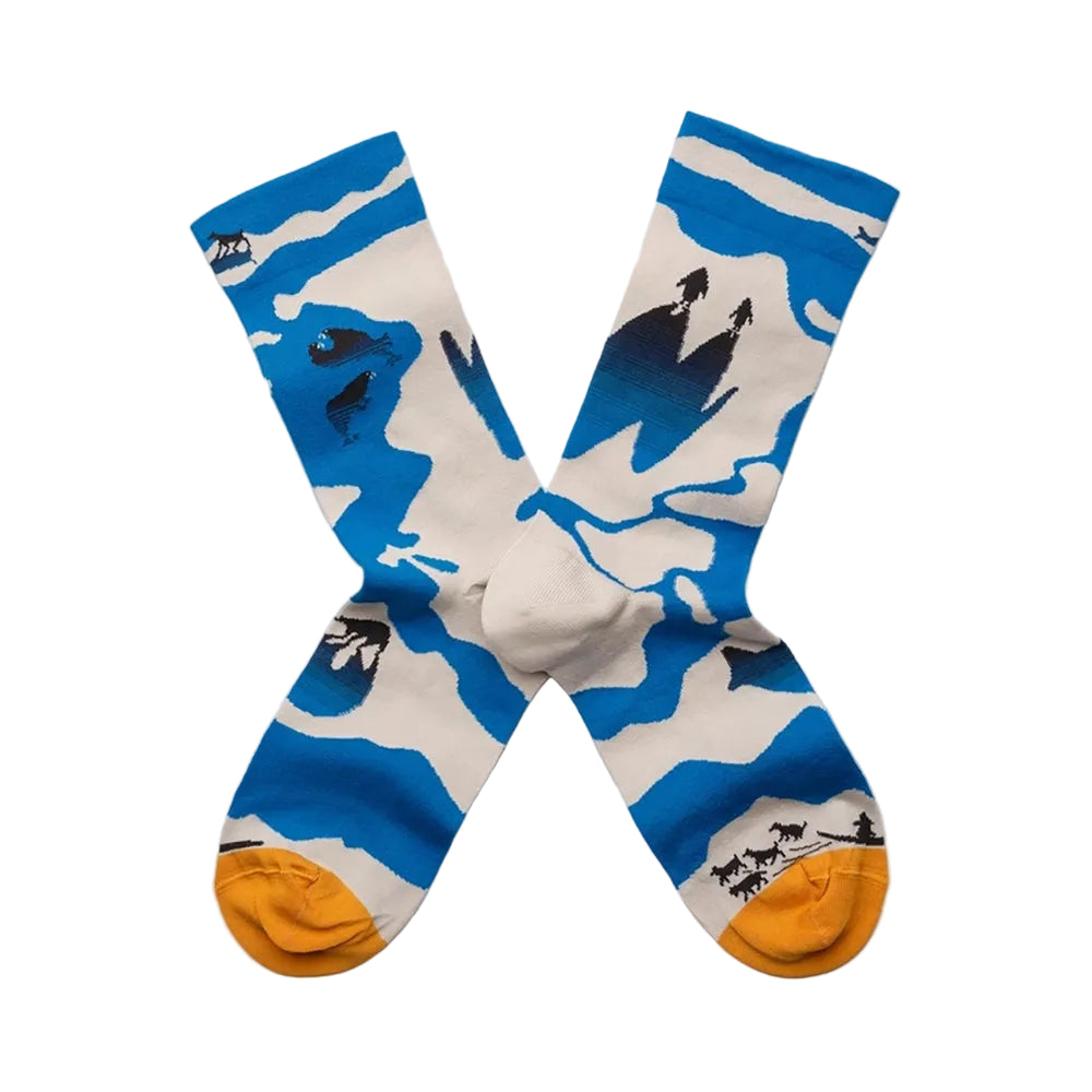 Pair of socks with blue, white, and yellow design on a white background