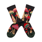 Pair of socks with mushroom pattern on a white background