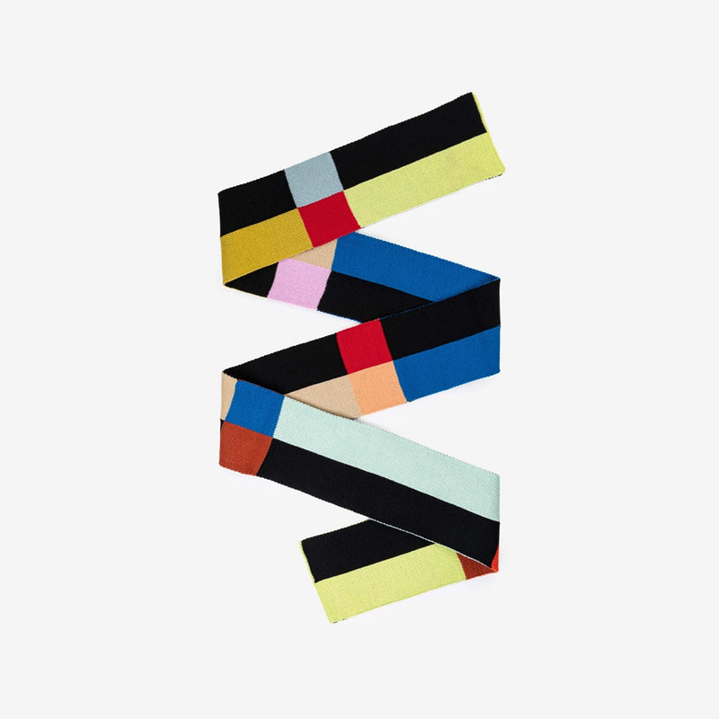 Colorful geometric-patterned scarf on a white background