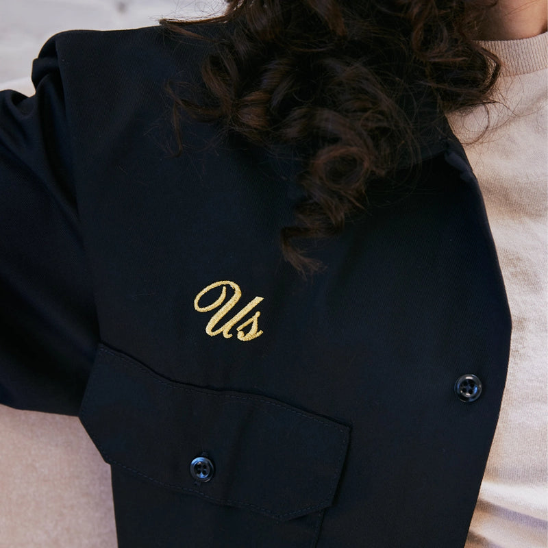 Us Them Workshirt showing gold embroidery detail on the shirt 