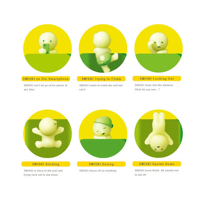 Set of six green and yellow SMISKI figures in various poses on a white background.