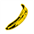 A sticker depicting a yellow banana with black spots and outlines.