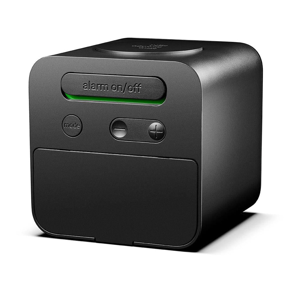 Black electronic device with control buttons on a white background