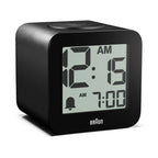 Black digital clock with digital display on a white background