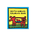Front cover of the Keith Haring Coloring Book, featuring a bright yellow background with a red cartoon animal illustration and black text, bordered by a blue frame on a white background.