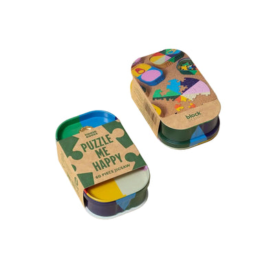 Two puzzle containers with colorful lids on a white background