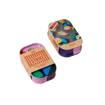 Colorful matchbox with a cardboard label on a white background