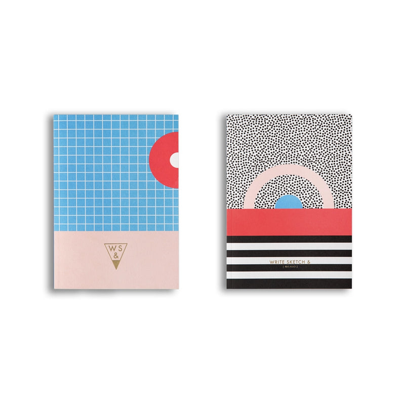 single paper cover notebook in black, white, blue, and red
