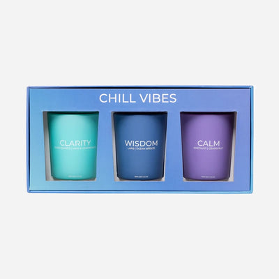 set of 3 candles in a blue box 