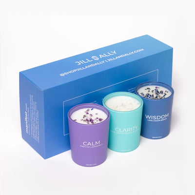 set of 3 candle with a blue box. Each candle contains crystal chips 