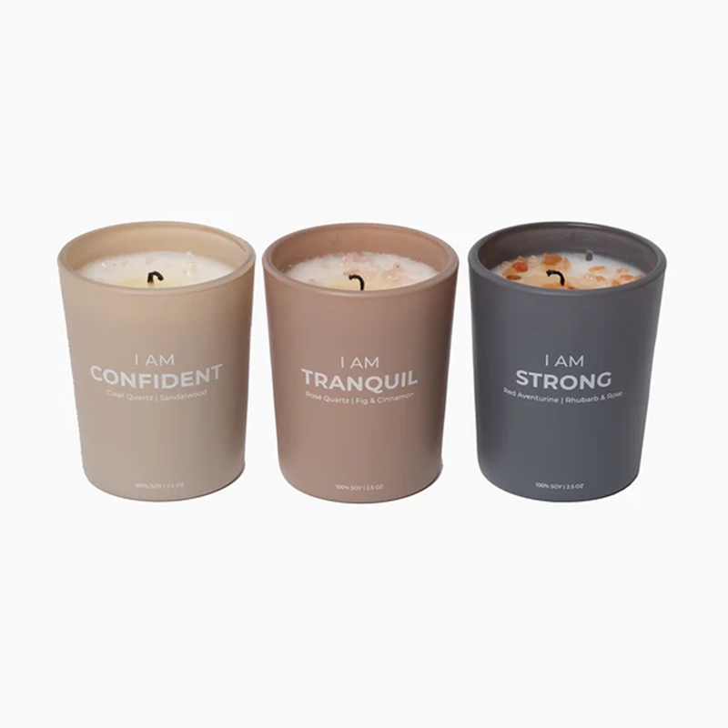 set of 3 candles that contains crystal chips.